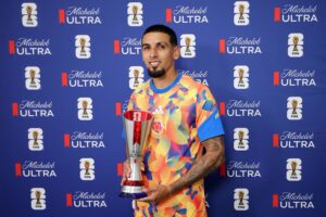 Munoz Fires Colombia Through as Lumumba Arrives