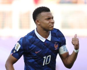 France Reach Quarters After Grudge Match